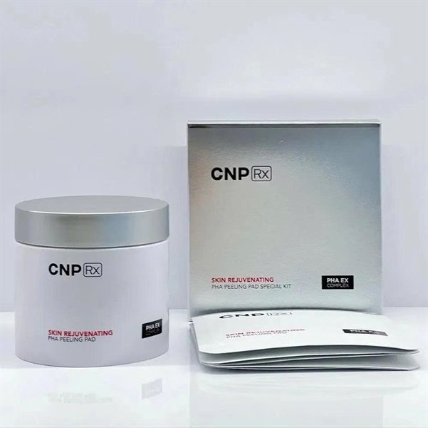 7745361f318a4904b3ca39944335d606 CNP - Toner Pad Rx Skin Rejuvenating PHA Peeling Pad - Hộp 60m tặng kèm 5 gói - EXP 202809